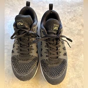 APL: Athletic Propulsion Labs Women's Techloom Sneakers in Black and Gold, 9.5.